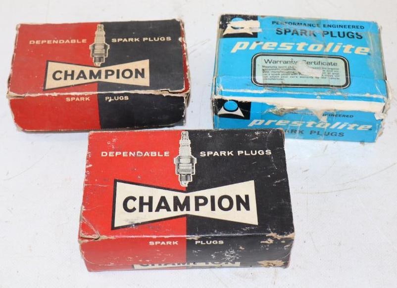 Group of 28 Champion And Prestolite Spark Plugs In Original Boxes: largest is 3.50" x 1"x 1"