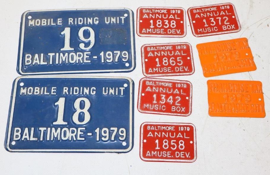Group of 9 1979 Baltimore Amusement And Mobile Devise License Plates: largest is 6" x 4"