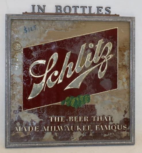 Schlitz "In Bottles" Reverse Painted Glass Sign: It has flaking to the background paint. 12.5' x 13.5"