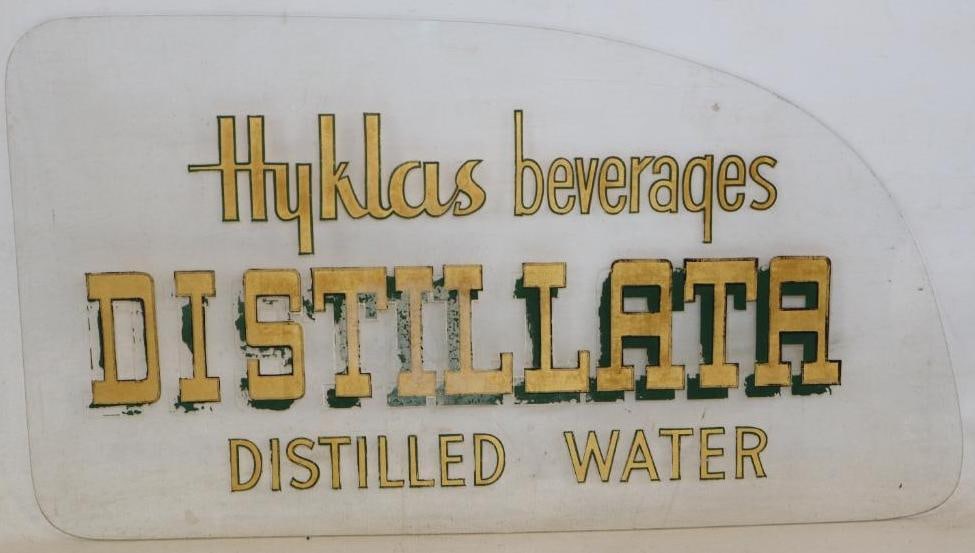 Hyklas Beverages Distillata Taxi Cab Window Advertisement: It is a plexiglass material. 30" x 17"