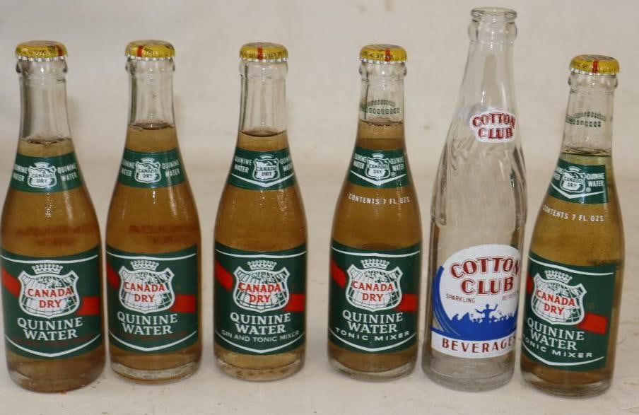 Group of 6 Canada Dry Quinine Water, and Cotton Club Sparkling Beverages Glass Soda Bottles: Canada Drys are 7oz and full with original caps. Cotton Club is 8oz and empty.