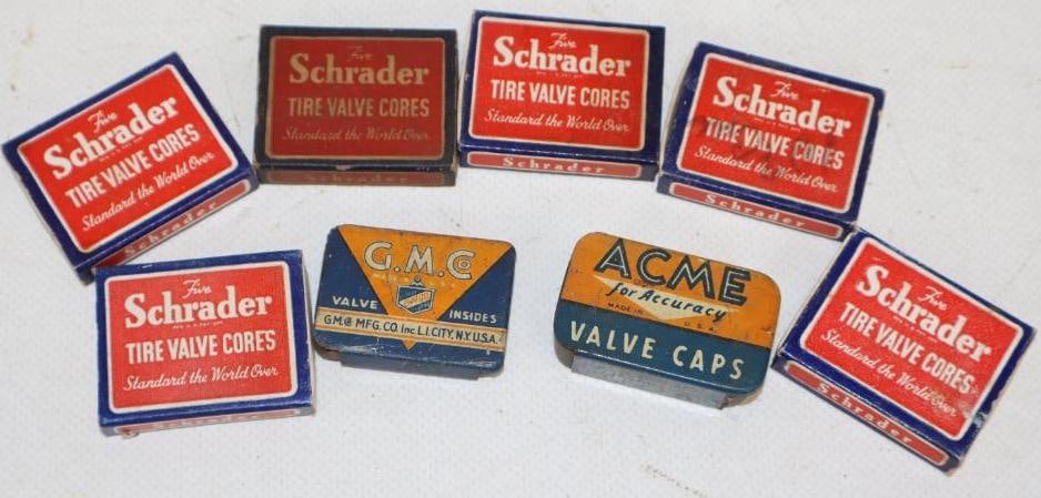 Group of 8 Schrader, Acme And GMC Tire Valve Cores/Caps: largest is 1.50" x 1.25" x .25"