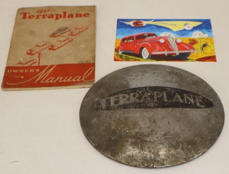 Group of 3 Hudson Terraplane Hubcap, Signed Artwork and 1937 Owners Manual: largest is 9" x 9" x 1"
