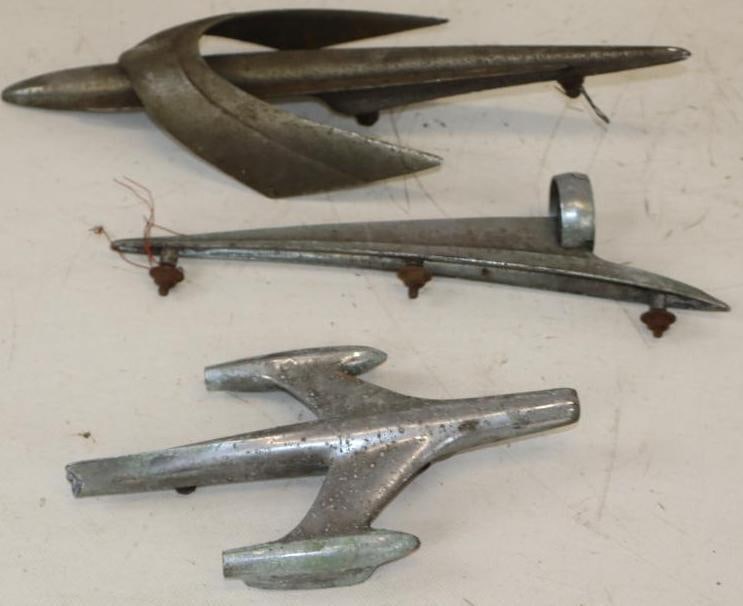 Group of 3 1950's Ford And Plane Shaped Hood Ornaments: largest is 13" x 4.50" x 2.25"