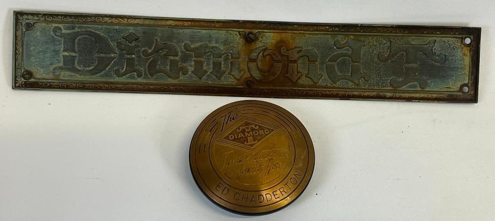 Group of 2 Diamond T Brass Horn Button And Embossed Emblem: largest is 12" x 2"