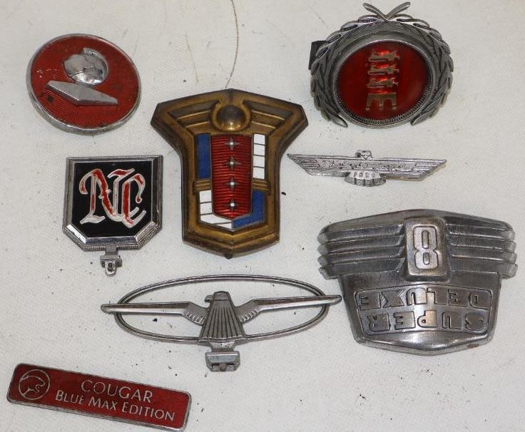 Group of 8 1950's and 1960's Hood Ornaments And Car Badges: largest is 3.75" x 2.50" x 1"