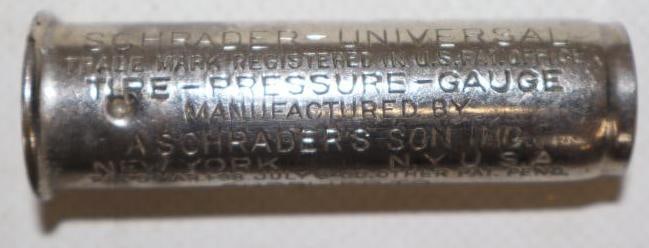 Geo. W. Nock Co. Triumph Advertising Tire Pressure Gauge: 2.50" x .75" x .75"