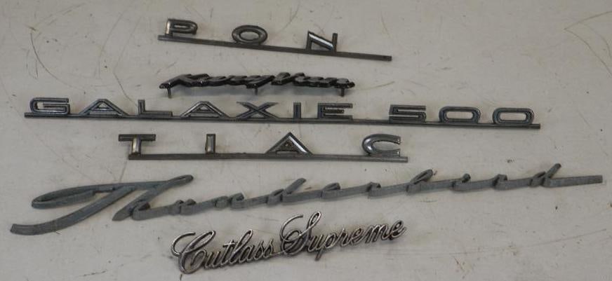 Group of 5 Pontiac, Cutlass, Galaxy, Thunderbird and Karyvan Automobile Emblem Scripts: largest is 20.50" x 2"