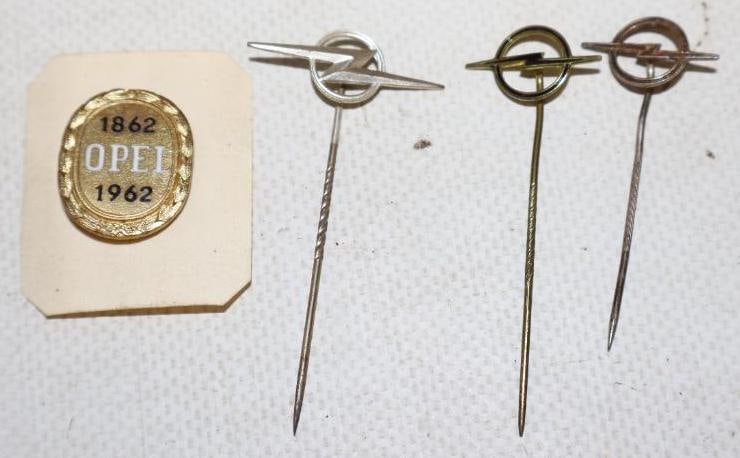 Group of 4 Opel Motor Car Co Stick Pins And Cloisonne Pin Back Badge: largest is .75" x 2"