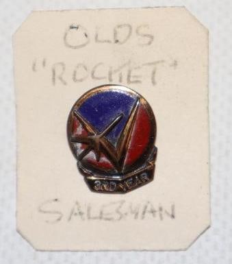 Oldsmobile Rocket Cloisonne Third Year Salesman Lapel Pin: .50" x .50" x .50"
