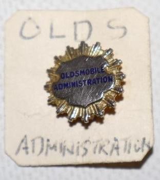 Oldsmobile Motor Car Co. Cloisonne Administration Pin Back Badge: .50" x .50" x .50"