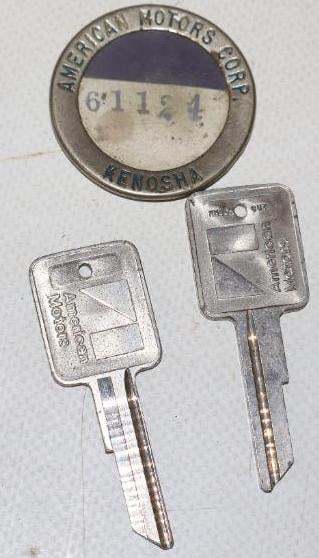 Group of 3 American Motors Employee Pin Back Badge And Uncut Keys: badge is missing pin back measures 1.50" x 1.50"