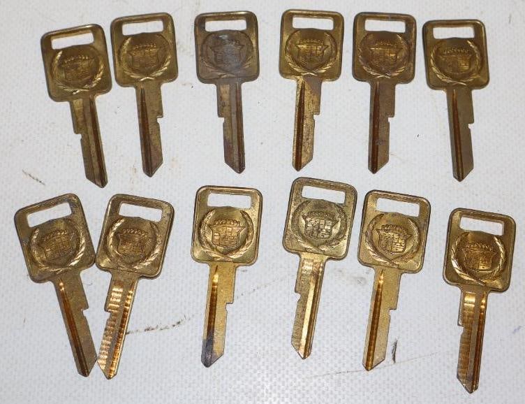 Group of 12 Cadillac Motor Car Co. Gold Uncut Ignition Keys (1 of 2)