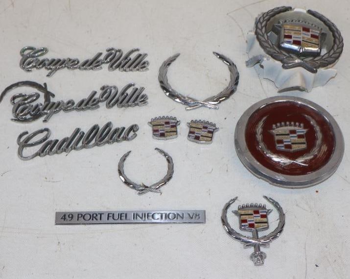 Group of 11 Cadillac Emblems, Center Cap And Fender Scripts: 4.50" x 4.50" x 1" is largest