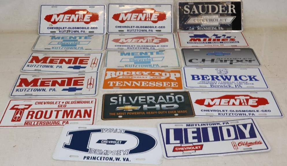 Group of 17 Chevrolet, Oldsmobile And Pontiac Dealership Metal Booster License Plates: 12" x 6" each