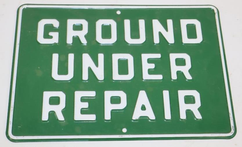 Embossed Metal Ground Under Repair Warning Sign (1 of 2)