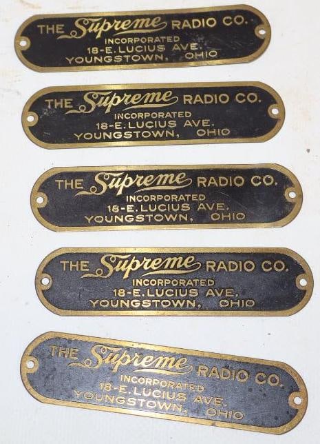 Group of 5 Supreme Radio Company Brass ID Tags: 3.50" x 1" each