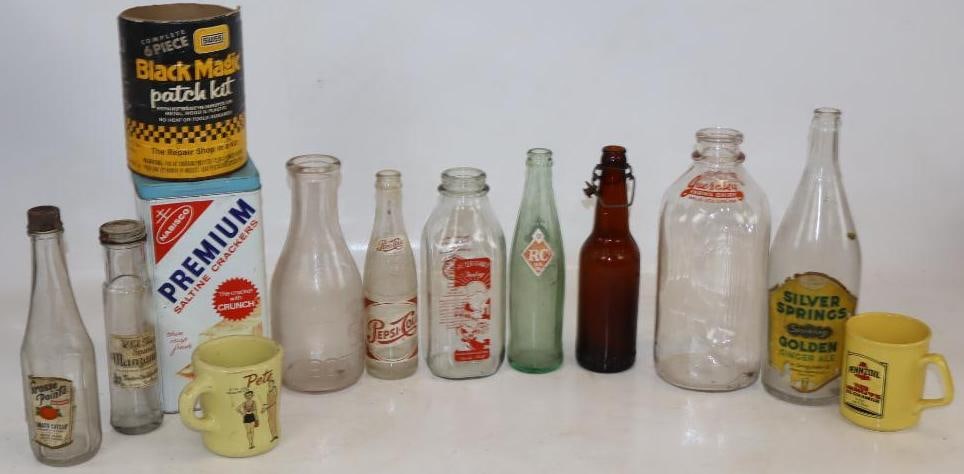 Group of 13 Household Glass Bottles, Cups, and Advertising Tin: Largest is 5" x 5" x 9.5"