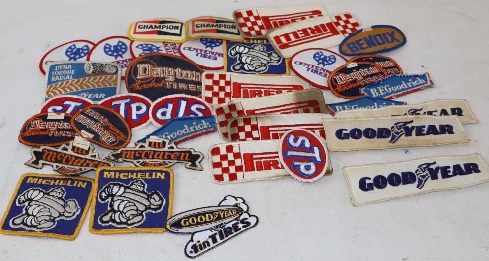 Group of 35 Dayton, Goodyear, McClaren And Pirelli Tire Advertising Patches: largest is 6" x 1.50"