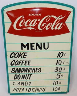 Drink Coca-Cola Embossed Fishtail Menu Board Sign: This sign is marked "AM 24." There is some light wear and staining throughout the field. There is some additional wear along the outer rolled edge. It is 29.5" x 19.5" and is graded an 8.5