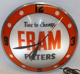 Fram Oil Filters Advertising Double Bubble Light Up Clock: This clock lights up and runs. It is in very good overall condition. It retains the original advertising products label on the back. 16" x 16" x 5". Graded 9.