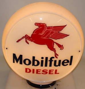 13.5" Mobilfuel Diesel Milk Glass Gas Pump Globe: This is a single lens Mobilfuel Diesel on an original wide milk glass body. The lens and body are both in very good condition with only one small flea bite chip near the outer edge of the lens. 16.5"