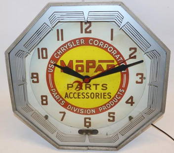 Mopar Chrysler Dealership Neon Advertising Clock: This clock has original paint on the can along with the original Neon Products label. It is in good working condition. The inner face is all original with some slight rust staining and wear. The outer