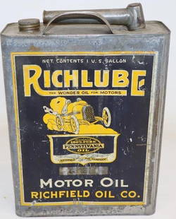 Richfield Richlube 1 Gallon Motor Oil Can with Racecar Graphics: This is a very desirable early graphic racecar can. It shows some light wear throughout the display side as well as on the reverse. 11.5" x 8" x 3". Graded 8.