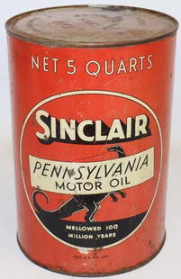 Sinclair Pennsylvania Standing Dinosaur Metal 5 Quart Motor Oil Can: This desirable standing dinosaur version has some light surface scratches and wear throughout. It is missing the bottom lid but does have the original copper top lid. 9.5" x 6.5" x 6.5". Graded 7.75.