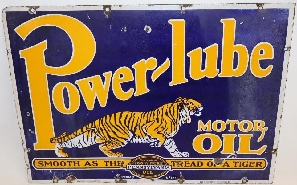 Graphic Power-Lube Motor Oil DSP Porcelain Sign: The display side shows some slight fading and discoloration near the left and right edges, along with some light surface scratches to the field. The reverse has heavier fading. It is marked Wolverine 