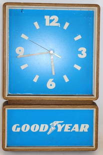 Goodyear Advertising Wall Clock: Battery operated and untested. 21" x 13.5" x 3"