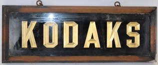 Kodaks Double Sided Reverse Painted Glass Advertising Sign