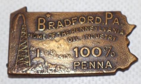 Brass Embossed Bradford PA State Shaped Home of the Pennsylvania Oil Industry Pin Back Badge: 1.75" x 1"