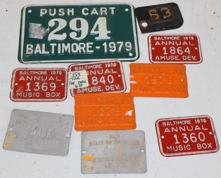 Group of 10 1979 Baltimore Franchise Tax Tags, Music Box, Vending Machine License, and Push Cart: Largest is 6" x 4"