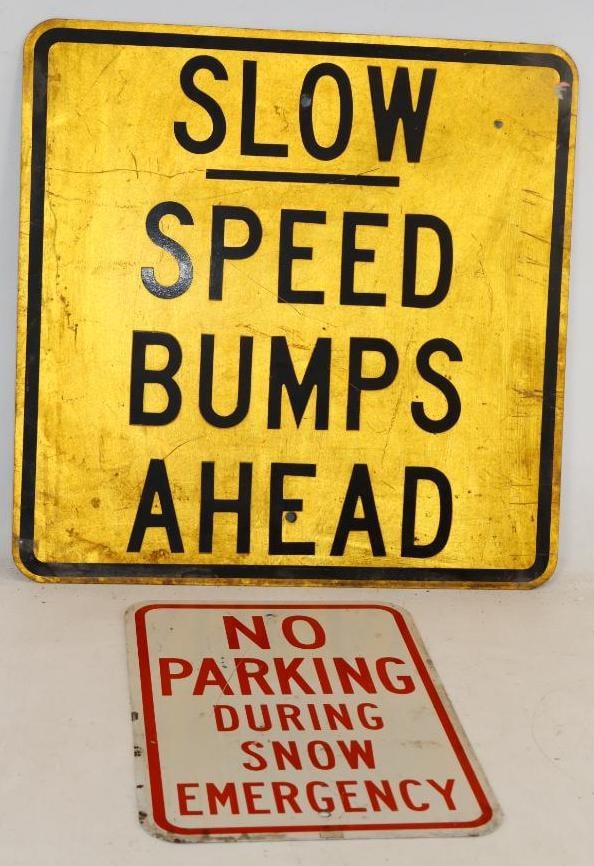 Group of 2 No Parking During Snow Emergency and Slow Speed Bumps Ahead Street Signs (1 of 2)