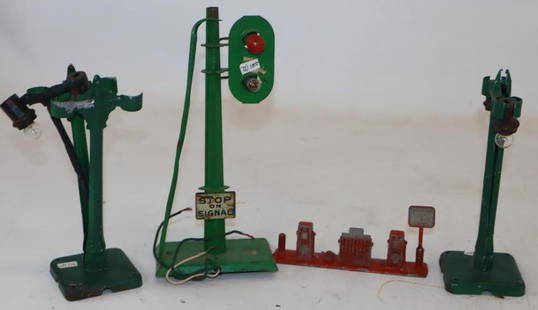 Group of 4 Train Crossing Signal, Lamp Post, and Gas Pump Model Train Accessories: Largest is 8.5" x 4" x 2.5"