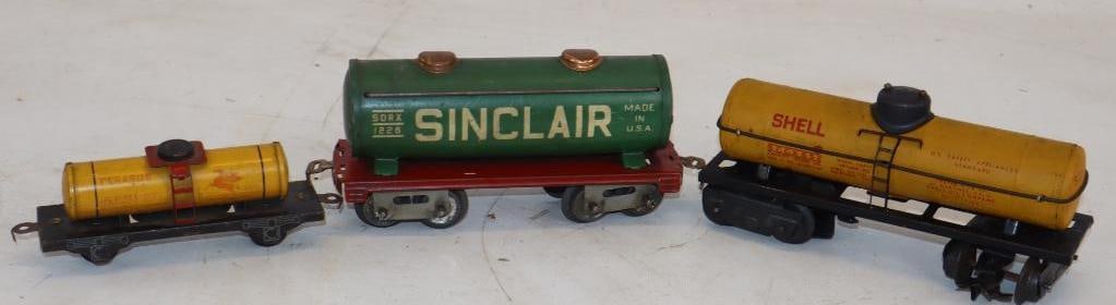 Group of 3 Tin Litho Toy Train Shell, Sinclair, and Pegasus Oil Company Tanker Cars (1 of 2)