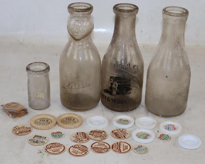 Group of 37 Advertising Milk Bottles and Caps: Largest is 32oz.