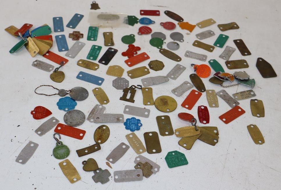 Group of 118 80's and 90's Used Dog Tags: Largest is 2" x 1"