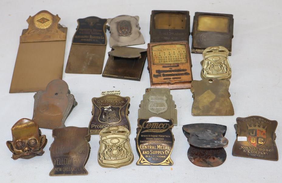 Group of 18 Brass, Copper, and Silver Advertising Clips: Largest is 7" x 3" x 1"
