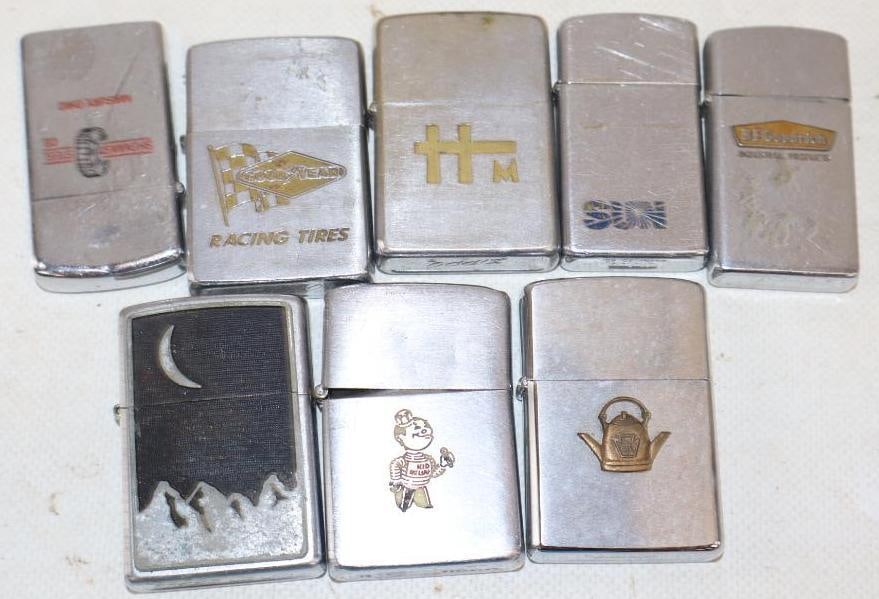 Group of 8 Advertising Zippo Refillable Lighters: Largest is 1.5" x 2.25" x .5"
