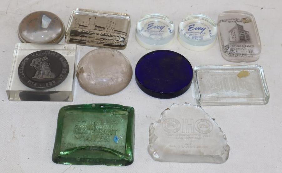 Group of 11 Glass Advertising Paperweights: Largest is 3.5" x 3.5" x 1"