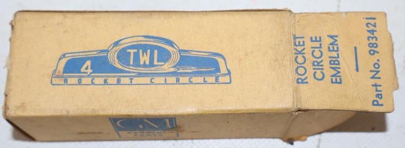 GM Genuine Parts Rocket Circle Emblem in Original Box: 3.5" x 1.5" x 1.5"