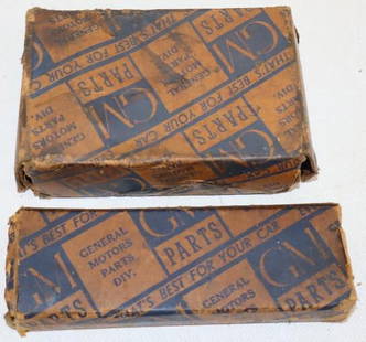 Group of 2 Early GM Parts in Original Boxes: largest 4.5" x 3" x 1.5"