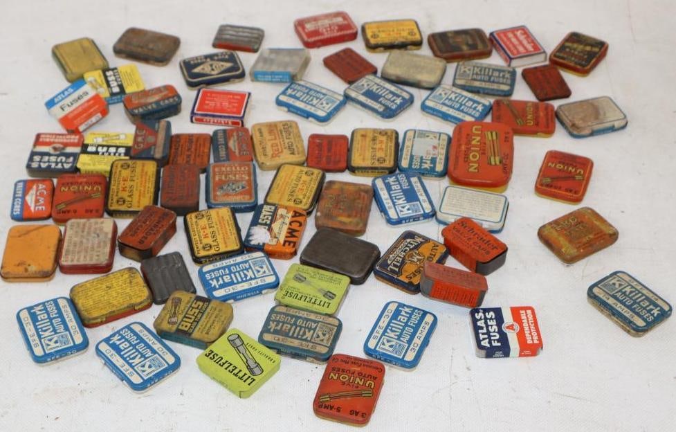 Group of 66 Automobile Fuses and Tire Valves Advertising Tins: largest 2.75" x 1.75" x .5"