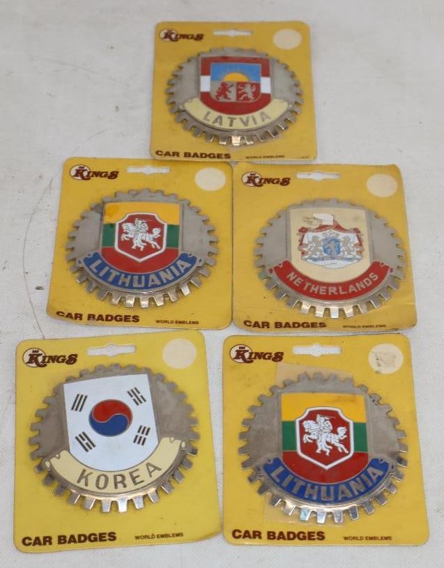 Group of 5 Korea, Lithuania, and Netherlands Radiator Badges in Original Packaging: 4.25" x 5.25"