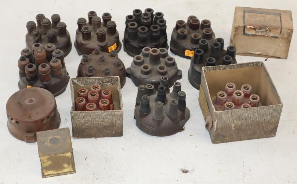 Group of 11 Early Automobile Distributor Caps: largest 3.5" x 3.5" x 2.75"
