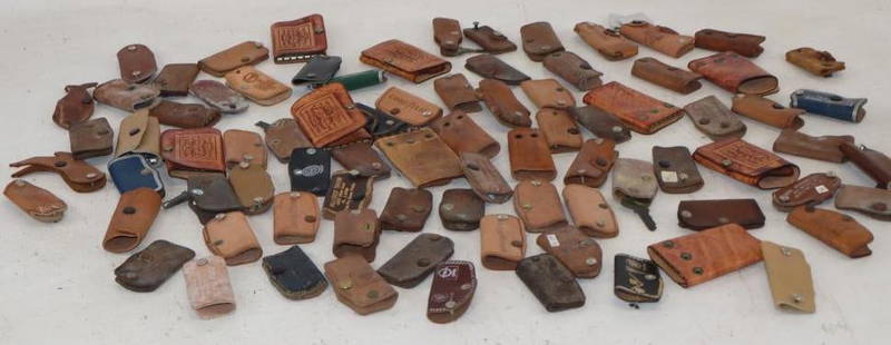 Group of 84 Leather Advertising Car Key Holders: largest 3" x 2"