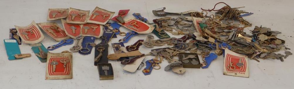 Large Group of Automobile Advertising Keys and Keychains: largest 6" x 3"
