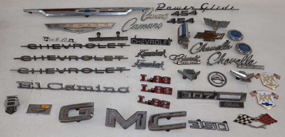 Group of 35 Chevrolet and GM Fender Emblems and Hood Ornaments: largest 18.5" x 1.5"